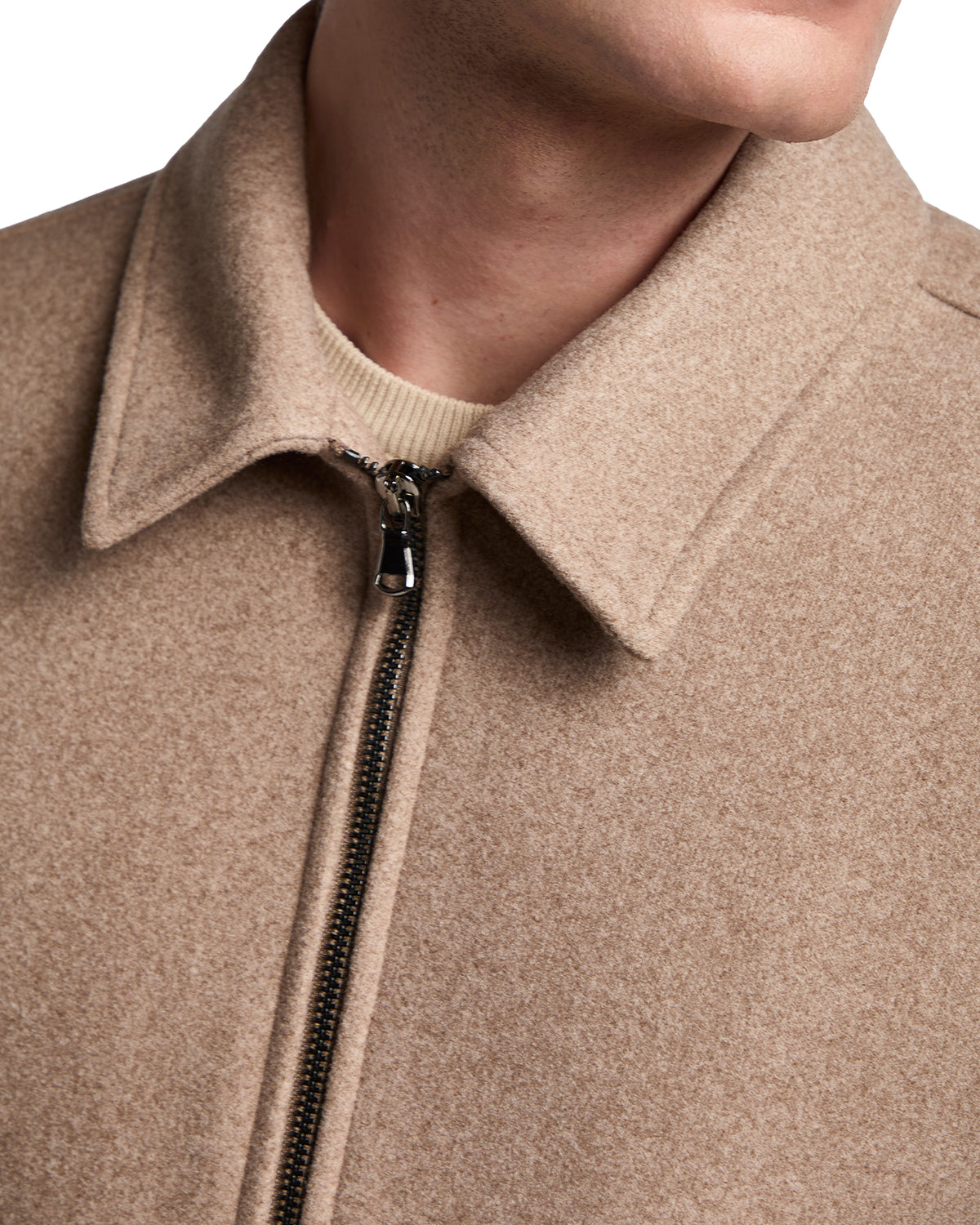 Beige wool blend jacket with a zip closure and classic collar, perfect for casual or semi-formal wear.