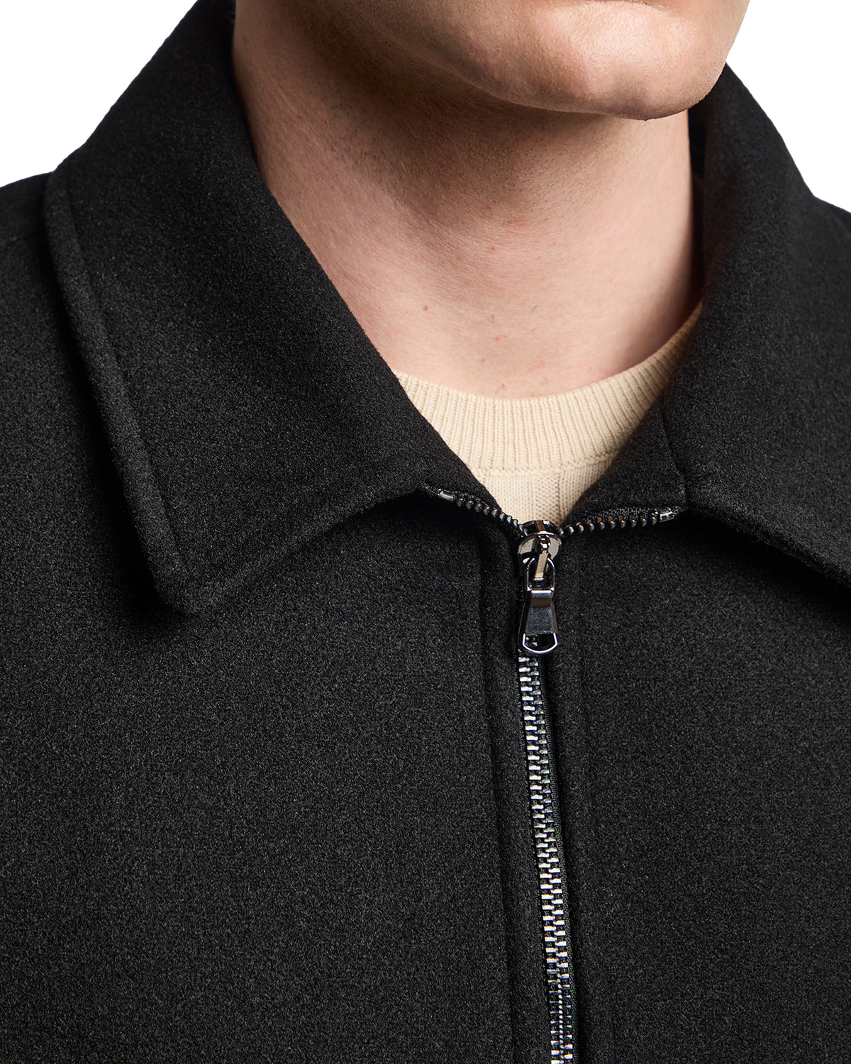 Black wool blend zip-up jacket with a classic collar and a sleek design, ideal for casual and formal wear.