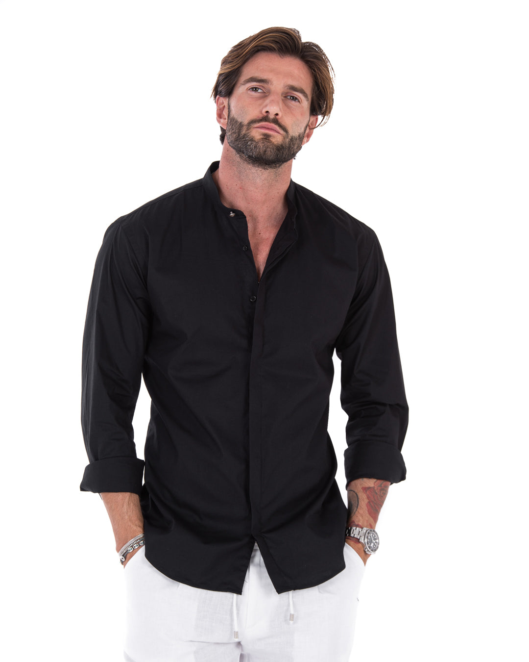 Men's black cotton shirt with mandarin collar and concealed placket, shown in full view on a model