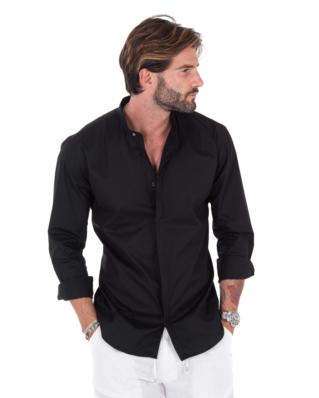 Men's black cotton shirt with band collar, shown in three-quarter view on a model