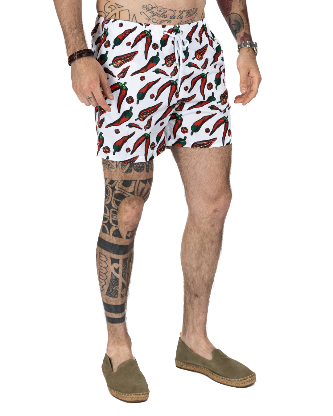Men's white swim shorts with red chili pepper print, drawstring waist, quick-dry fabric. Casual beachwear style.