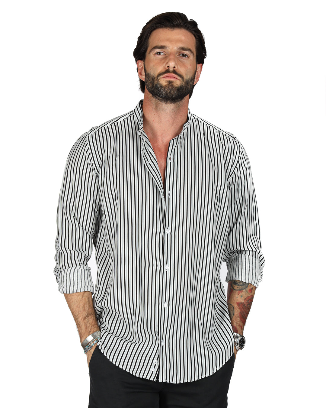 Men's black and white striped shirt with band collar and long rolled sleeves, shown on a model