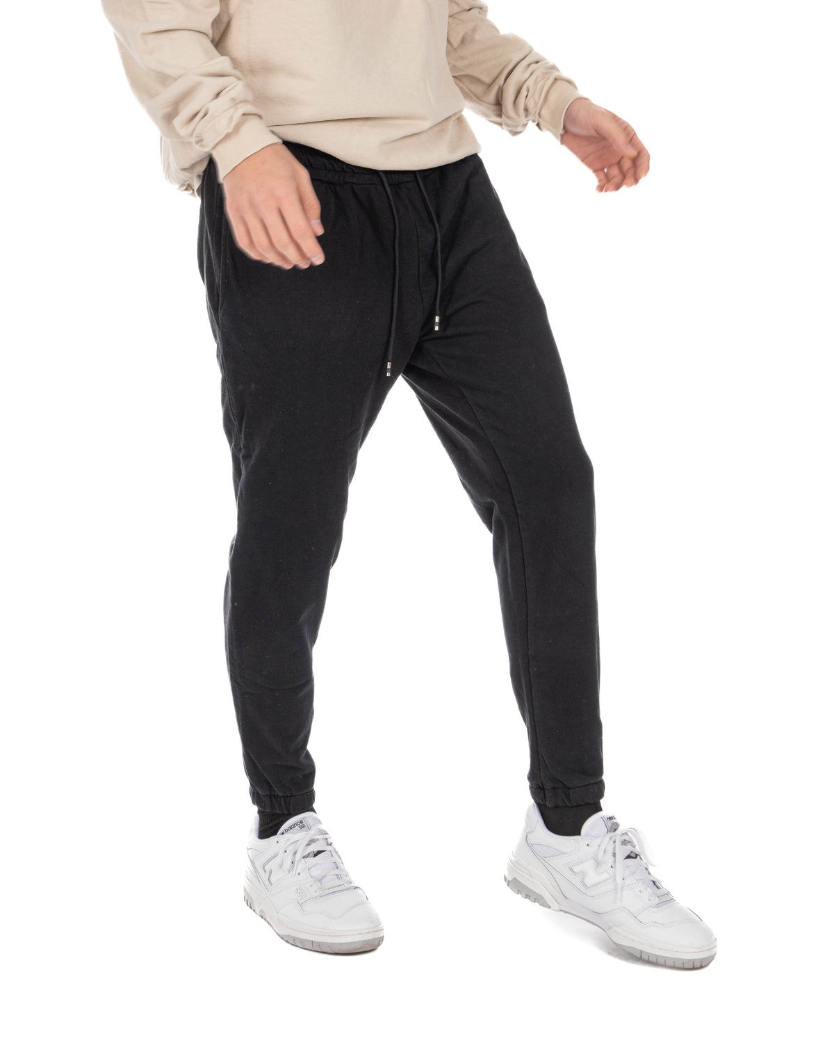 Front view of men's black cotton jogger pants with drawstring waist and elastic cuffs